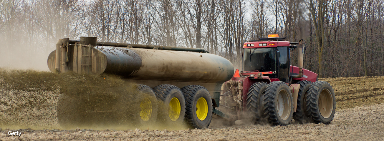 Trucking spraying fertilizer