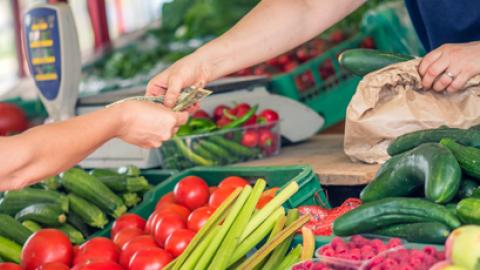 Paying in cash at farmers market