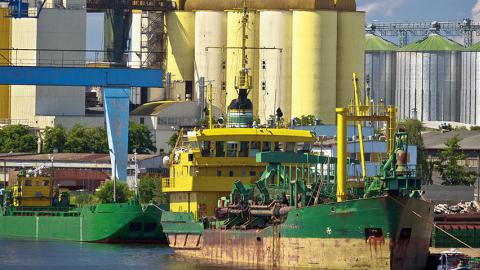 Boats near silos