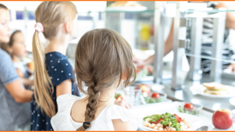 Photo of children in a school cafeteria.