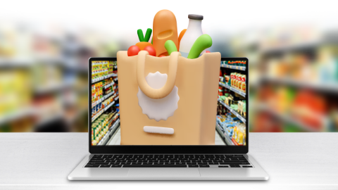 Photo illustration of a computer with a bag of groceries on the screen and a grocery store aisle in the background.